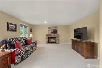 The upper bonus / family room includes the home's 3rd fireplace.