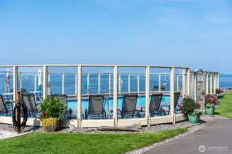 Outdoor heated swimming pool overlooks Puget Sound.