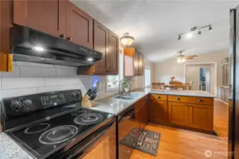 There a abundance of storage plus an utility room with washer & Dryer.