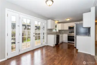 Appliances include Samsung dishwasher, 5 burner electric range & microwave, LG refrigerator.  Laundry room has matching LG front loader washer/dryer