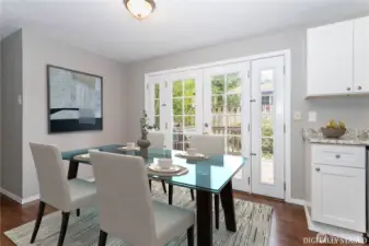 French doors lead out to modest rear deck.