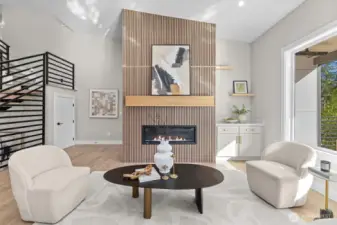 Open-concept great room with "statement" fireplace design