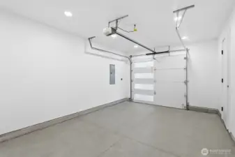 1-car garage, driveway parking, and space for RV parking. EV charger ready.