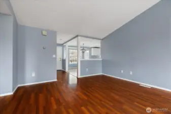 View from the living room to the dining area with bay window.