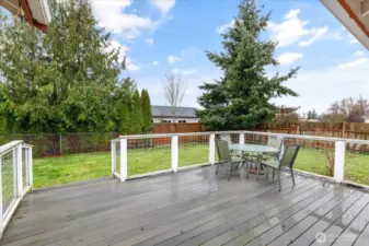 Spacious deck perfect for relaxing and entertaining.