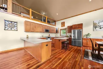 Chef’s kitchen featuring expansive cabinetry, premium countertops, and a functional layout for the cook