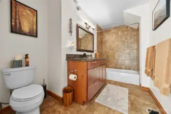 Well-appointed full guest bathroom conveniently located near the second bedroom and stairs to loft