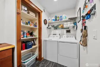 Dedicated laundry and utility room designed for maximum organization and convenience