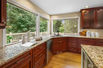 Slab countertops and stainless appliances for effortless cooking.