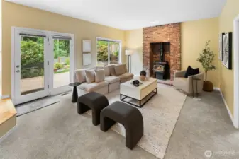 Spacious family room just off the kitchen with backyard views.