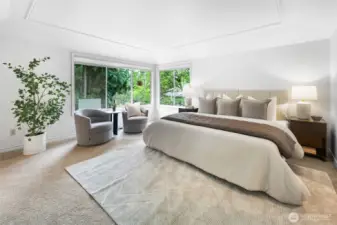 Expansive Edmonds primary suite with vaulted ceilings.