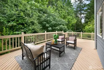 Surrounded by natural vegetation for privacy and shade.