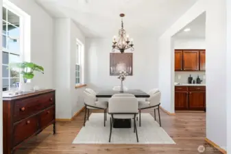 The dining area flows beautifully from the living space, making entertaining effortless.