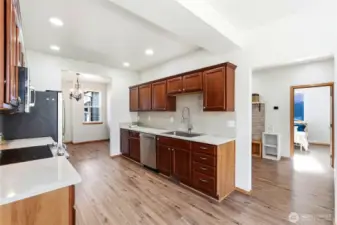 Generous prep space and cabinetry make cooking both functional and enjoyable.
