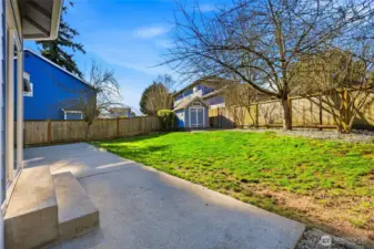 The fully fenced yard offers privacy and flexibility.