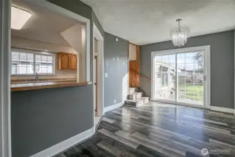 Stairs take you upstairs to primary bed/bath