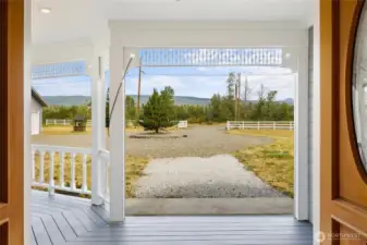 Charming woodwork on the covered front porch