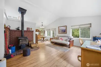 Another view showing the dining area beyond the spacious living room.