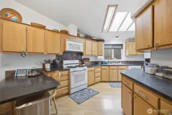 Another view showing the tiled backsplash that really finishes off the counters and cabinets.