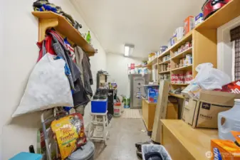The additional storage room has a lot of good storage space and opens out on to the large cedar deck.