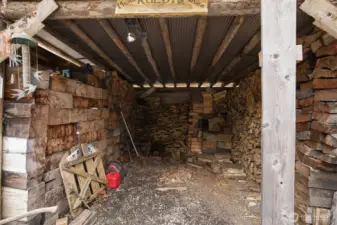 There is quite a lot of wood stored in the shed to keep that wood stove burning.