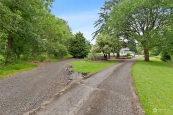 Driveway easement to the left. Lot 3 is the first Lot with old garage. Home and driveway to right is listed separately.