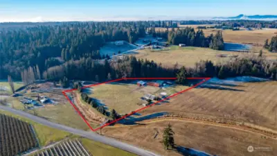 Home and outbuildings are ready for occupancy! Approx 6 acres of cross fenced pasture. Property outline is approx