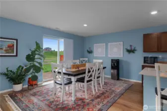 Large dining space with direct access to backyard overlooking The Preserve - note the privacy!