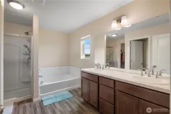 Primary en-suite with double sinks and plenty of space.