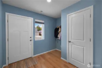 Large Entryway with nook and coat closet.