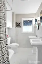 a fully redone bathroom completes the main level space