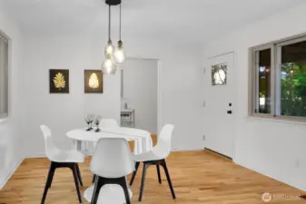 this dining area is perfectly !situated next to the covered back deck, perfect for entertaining