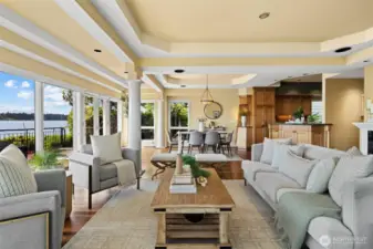 Thoughtfully reimagined with an extensive, high-quality remodel in 2002, the home features a light-filled floor plan with warm Eucalyptus floors, French doors, and expansive view decks and balconies that invite indoor-outdoor living.