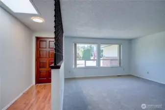 Entryway and large living room