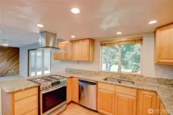Spacious kitchen with granite counters and stainless appliances