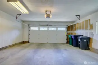 Spacious garage enters the home into the family room