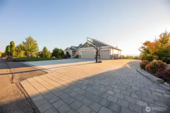 Extended paver driveway for all your vehicles or RV with basketball hoop