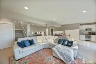 Room for all your friends with a wet bar, beverage fridge and microwave for easy popcorn nights!
