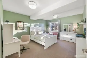 Step in to one of the downstairs primary for a quiet retreat.