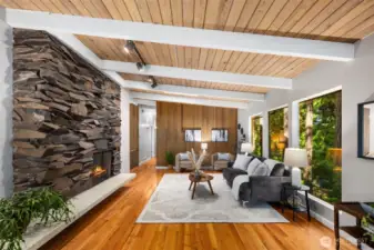 Gorgeous mid-century modern fireplace and beams in living room