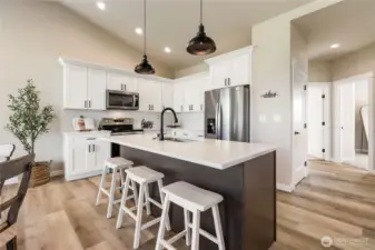 Pantry to the right of the kitchen for easy access