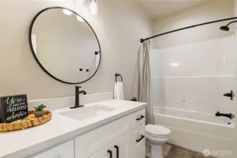 Full bathroom serves both the 2nd and 3rd bedroom