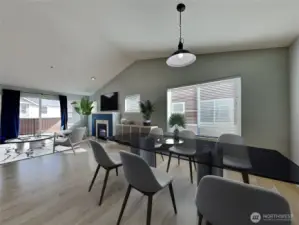 Looking in from entryway to staged dining living and slider to back deck