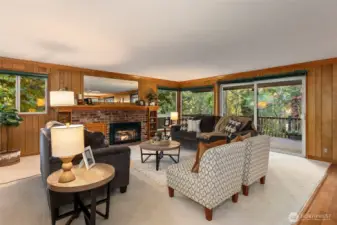 Bring the outdoors in with walls of windows and forest views