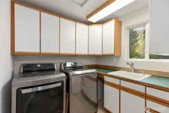 Plenty of storage in this laundry room!