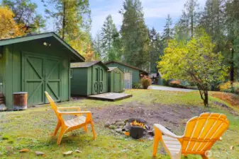 Outbuildings, garden space, and fire pit