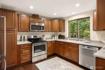 Updated kitchen with new refrigerator.