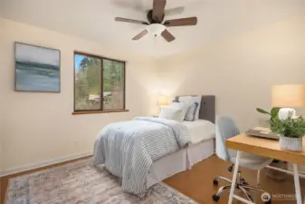 Bedroom #THREE looks out the towards the backyard.