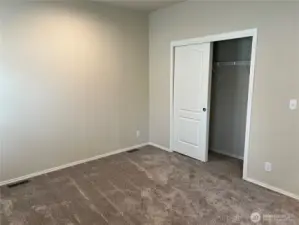 Primary bedroom closet area.