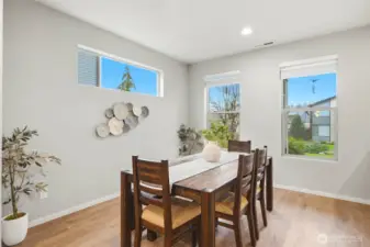 Formal dining space with clean finishes and open layout, ideal for hosting dinner parties or casual gatherings.
